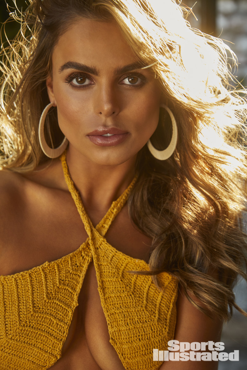 Brooks Nader was photographed by James Macari in Montenegro. Swimsuit by Andi Bagus. Earrings by JustFab.